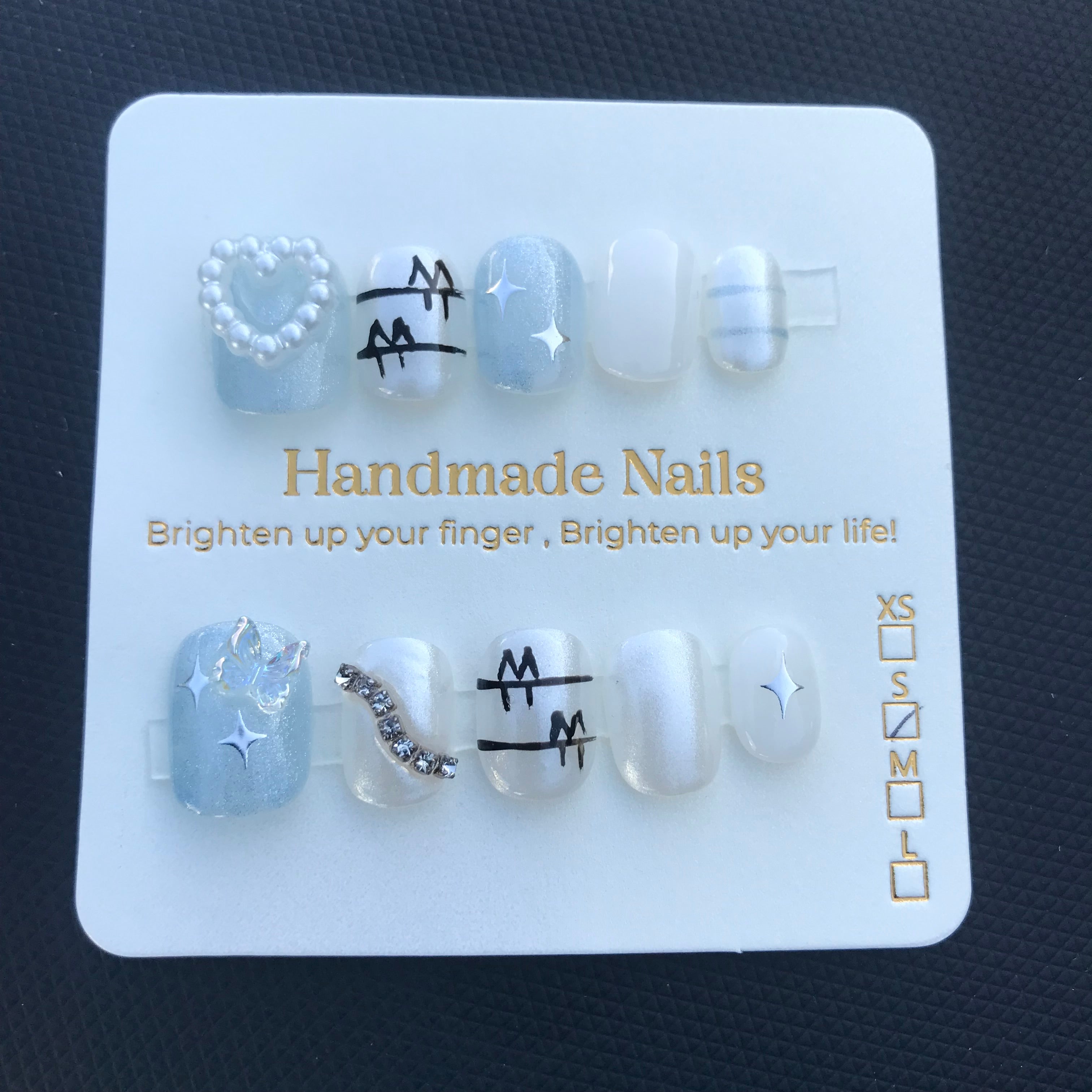 Blue, white and black press on nails