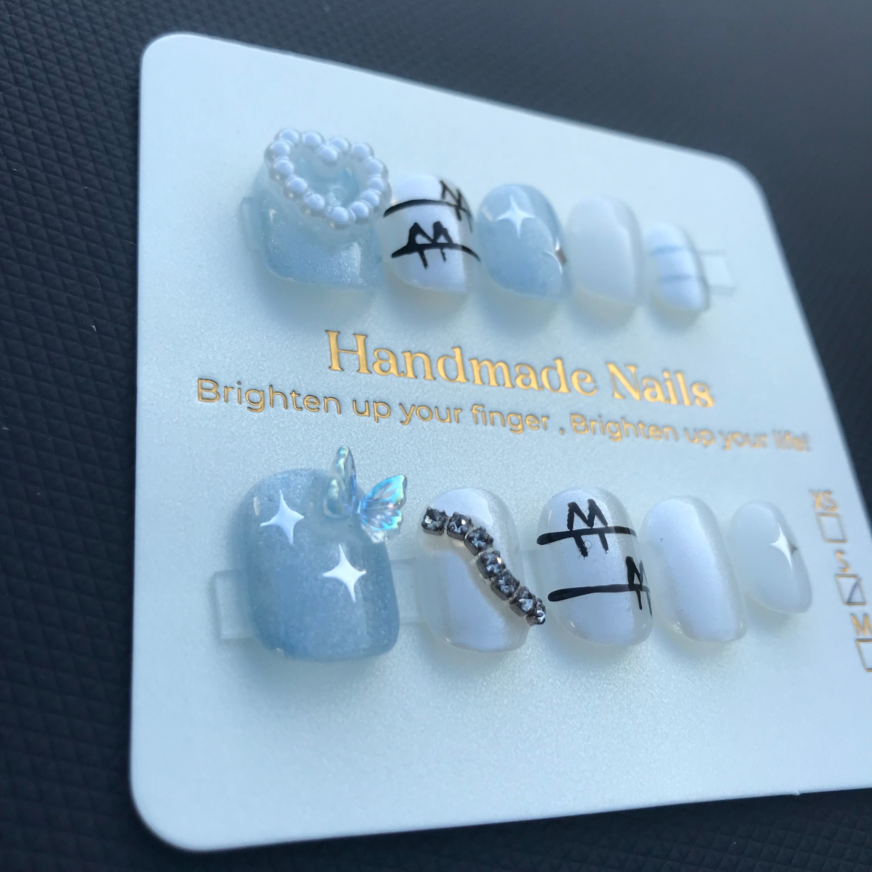 Blue, white and black press on nails