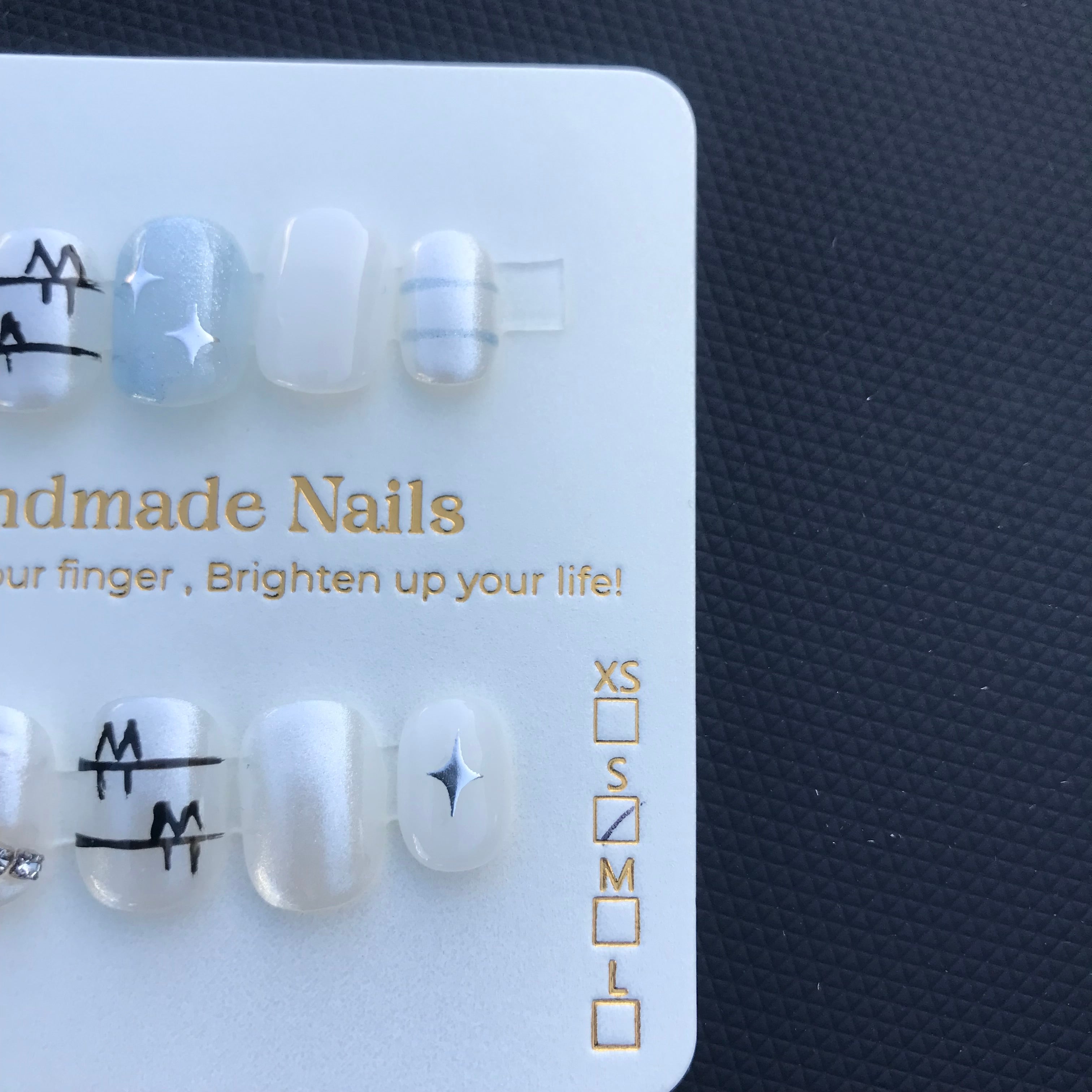 Blue, white and black press on nails